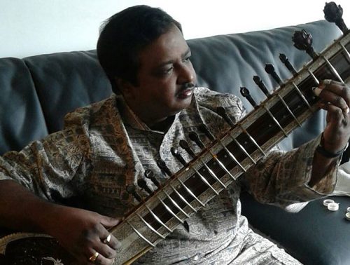 Dhribajyoti Chaktaborty relaxing with his sitar